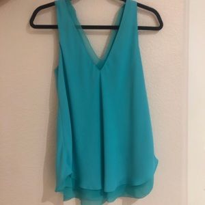 Turquoise blouse!